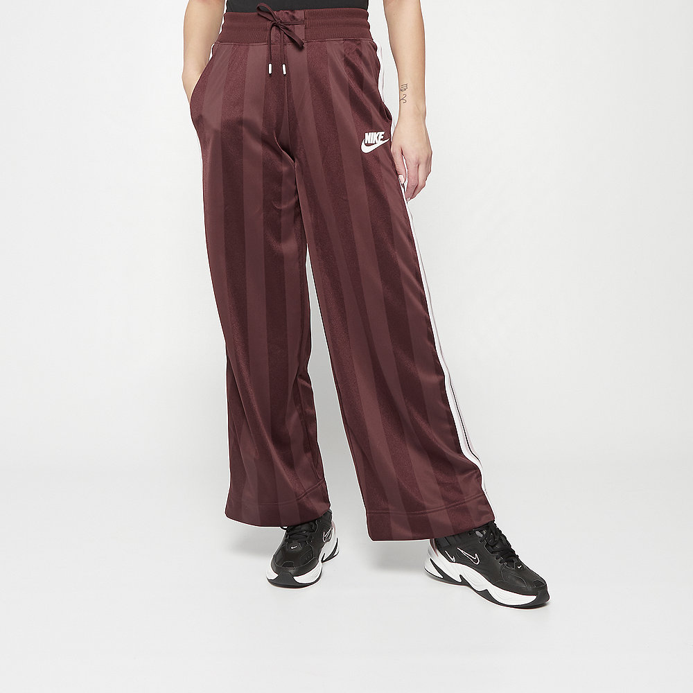 NIKE NSW Pant OH SHDW STRP el dorado/antique silver/white